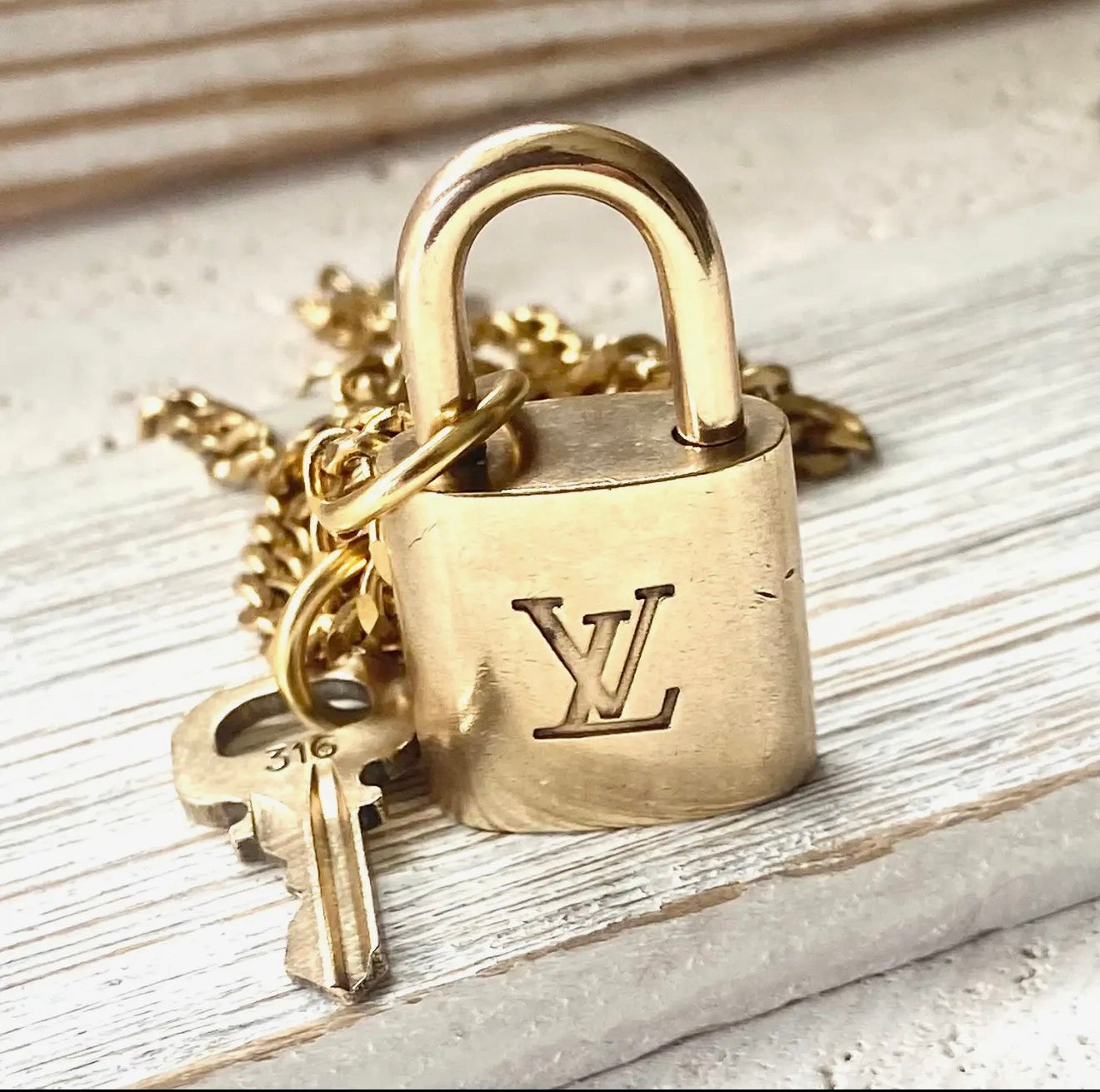 Authentic Louis Vuitton Lock Necklace | Cuban Link