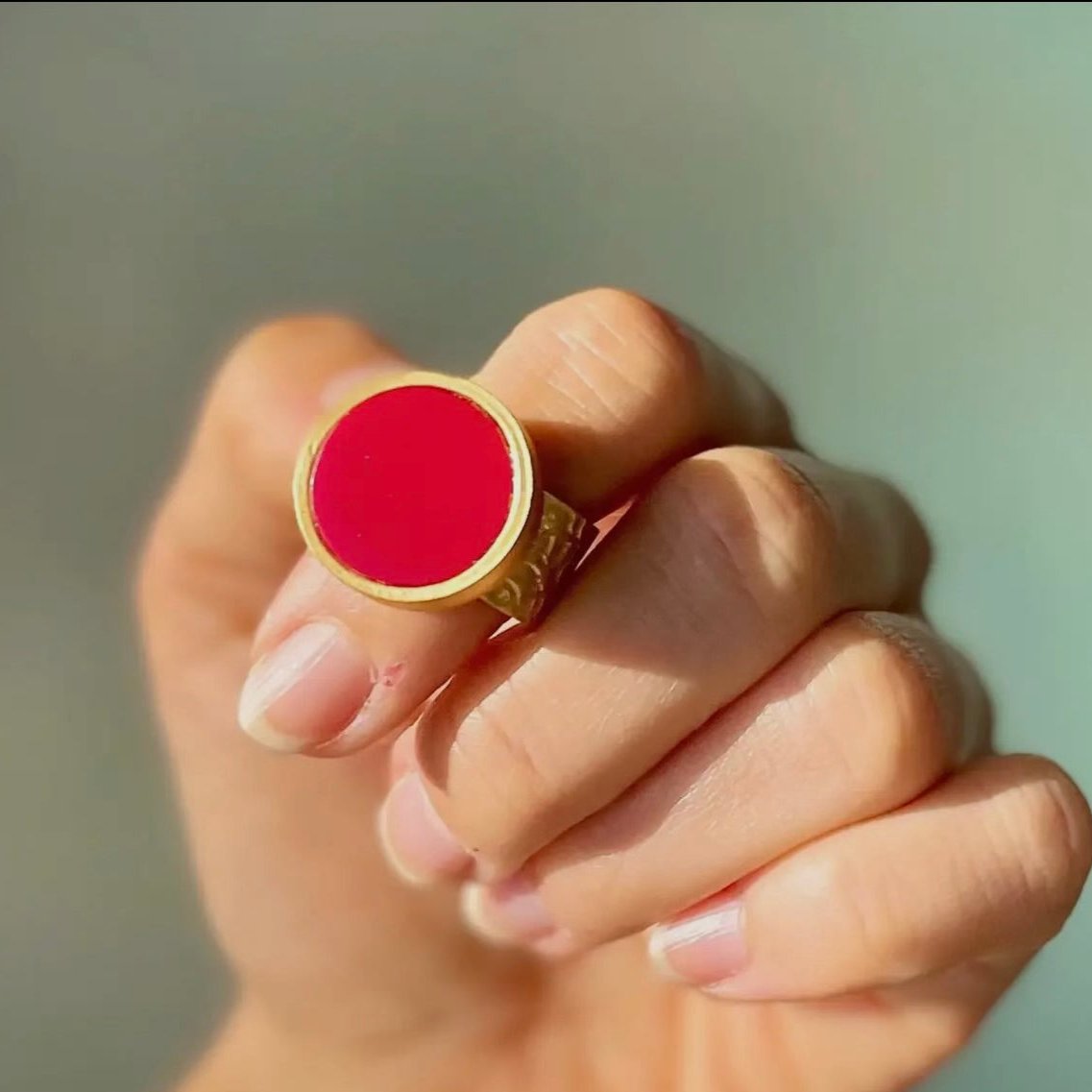 Determined Coral Ring
