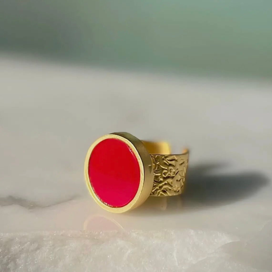 Determined Coral Ring