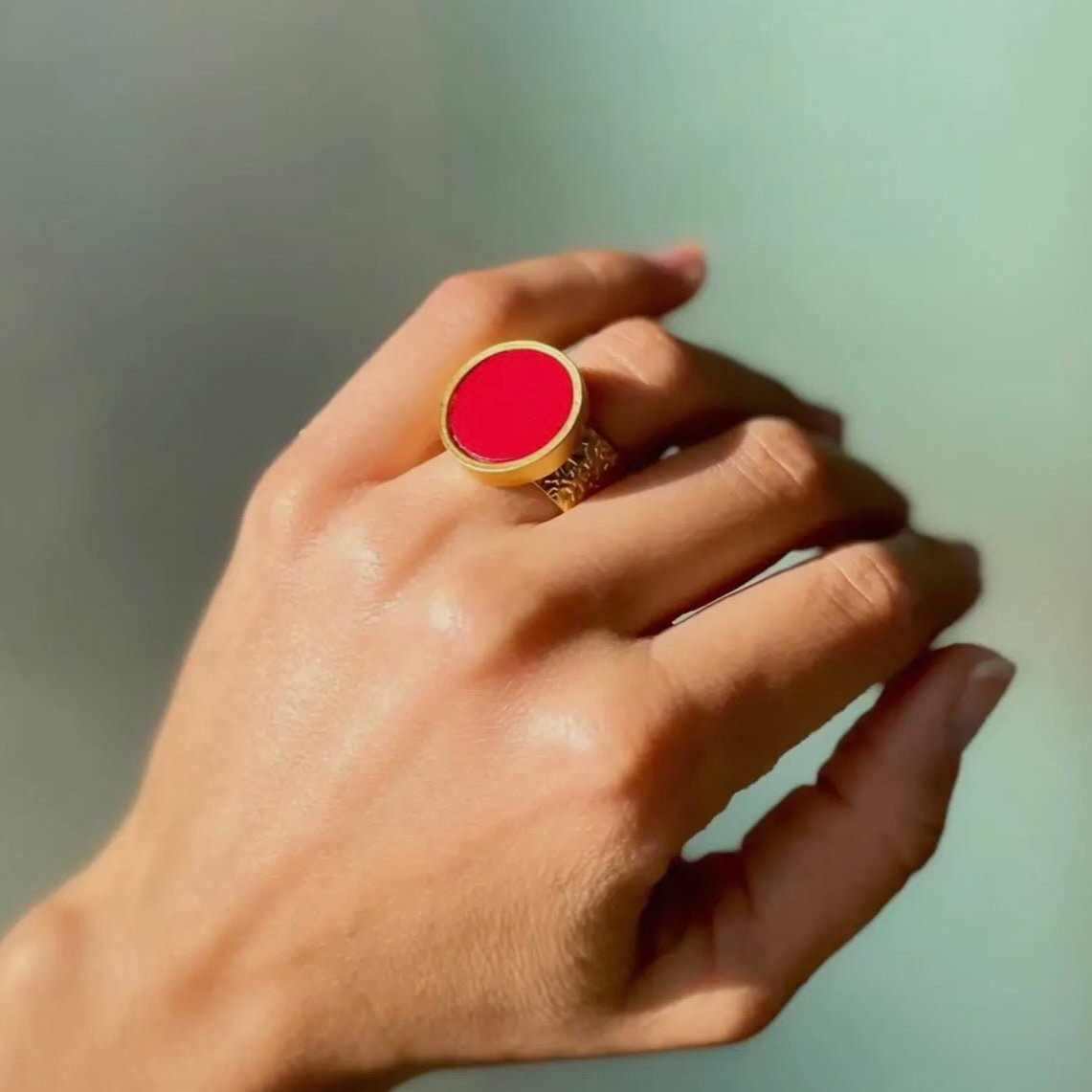 Determined Coral Ring