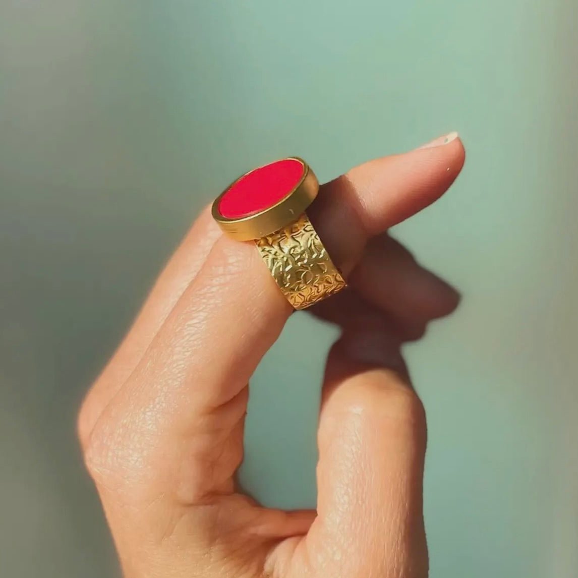 Determined Coral Ring