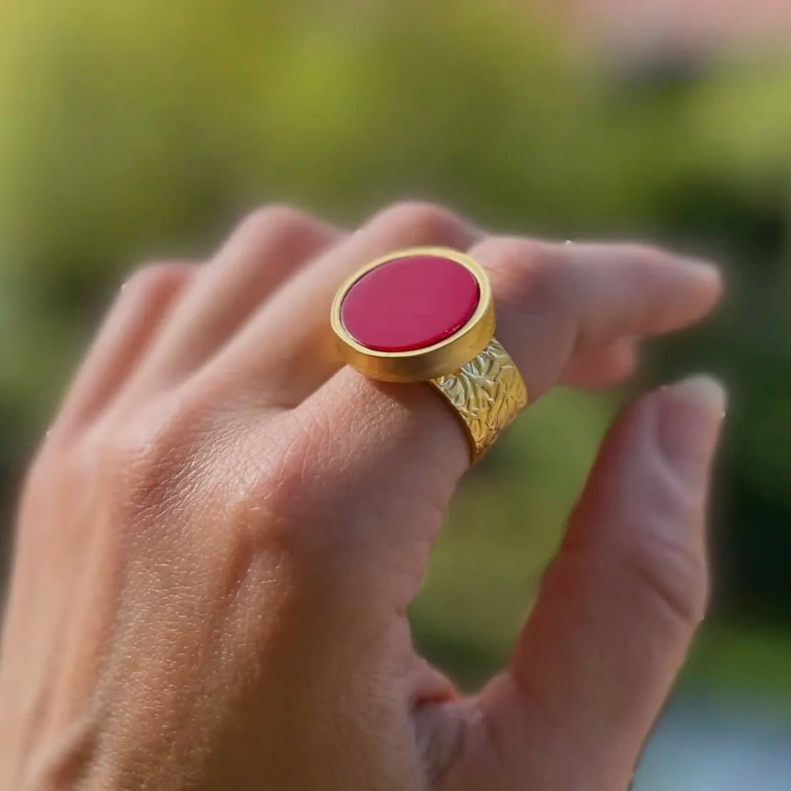 Determined Coral Ring